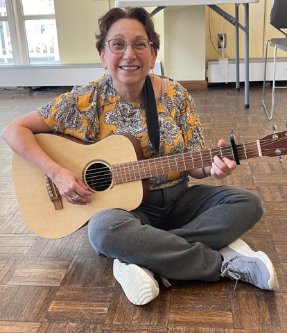 Amy Hersh with her guitar