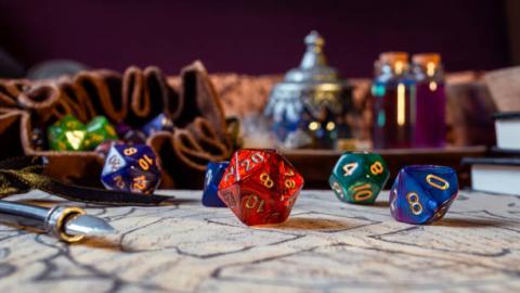 A table featuring multiple-sided dice used for playing Dungeons and Dragons
