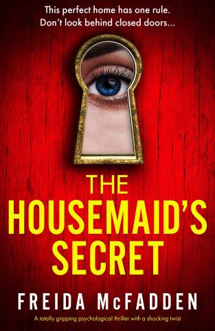 A woman's eye looking through a keyhole, above the title "Housemaid's Secret" above the name Frieda McFadden