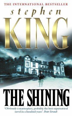 The name Stephen King in gold is at the top, and the title "The Shining" is written in black across the bottom. The center is a black and white image of a large estate with a small, transparent, ghostly child on the front