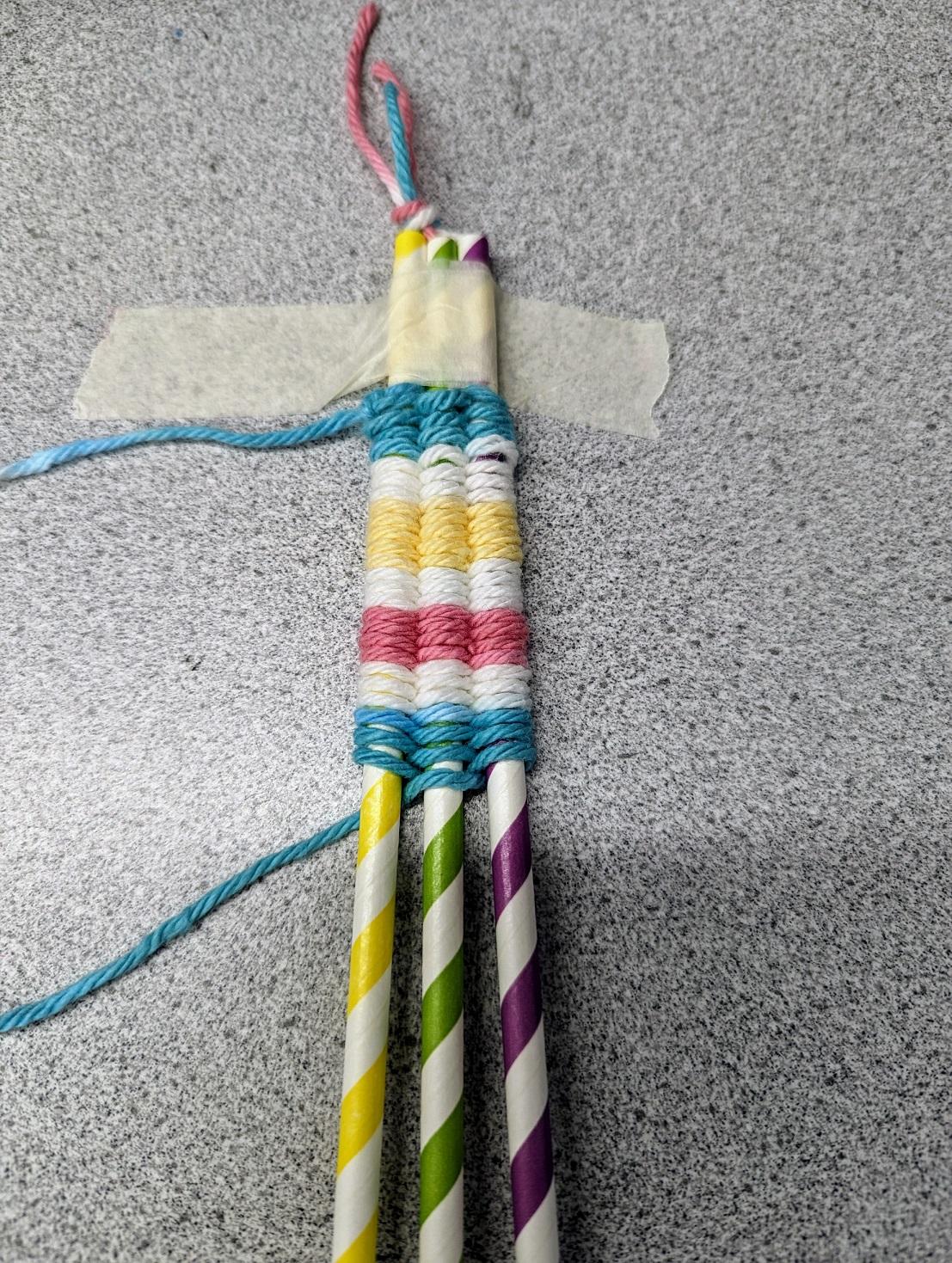 Weaving on a loom made of drinking straws